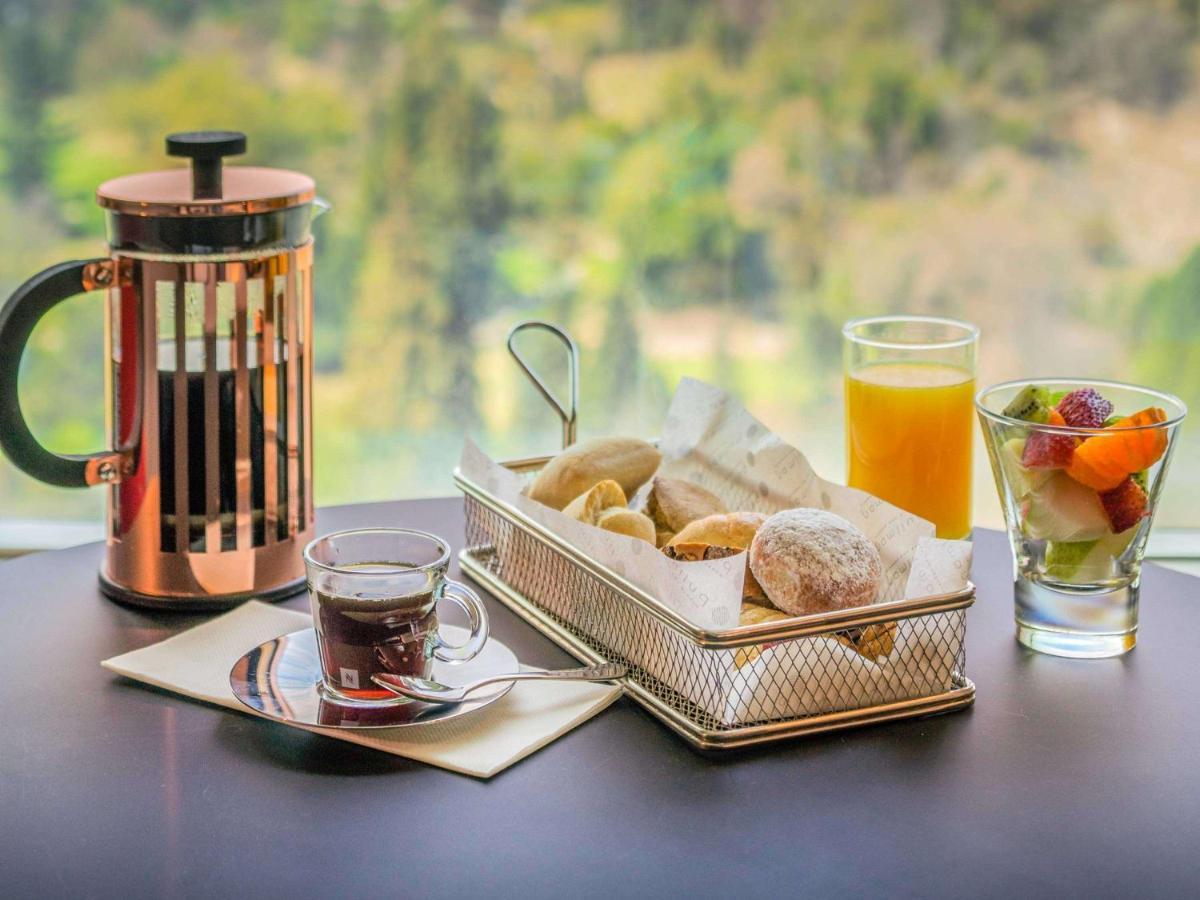 Pullman Santiago Vitacura Extérieur photo A French press