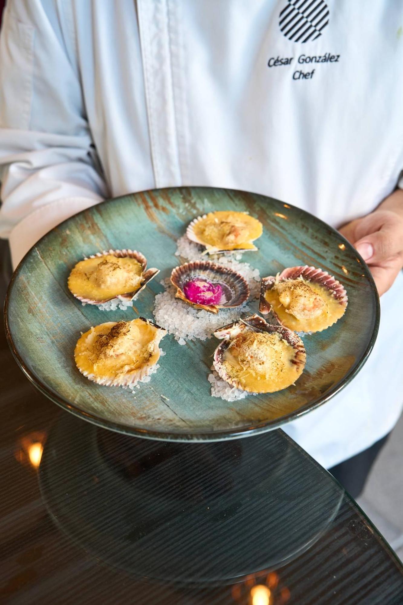 Pullman Santiago Vitacura Extérieur photo A plate of cooked scallops
