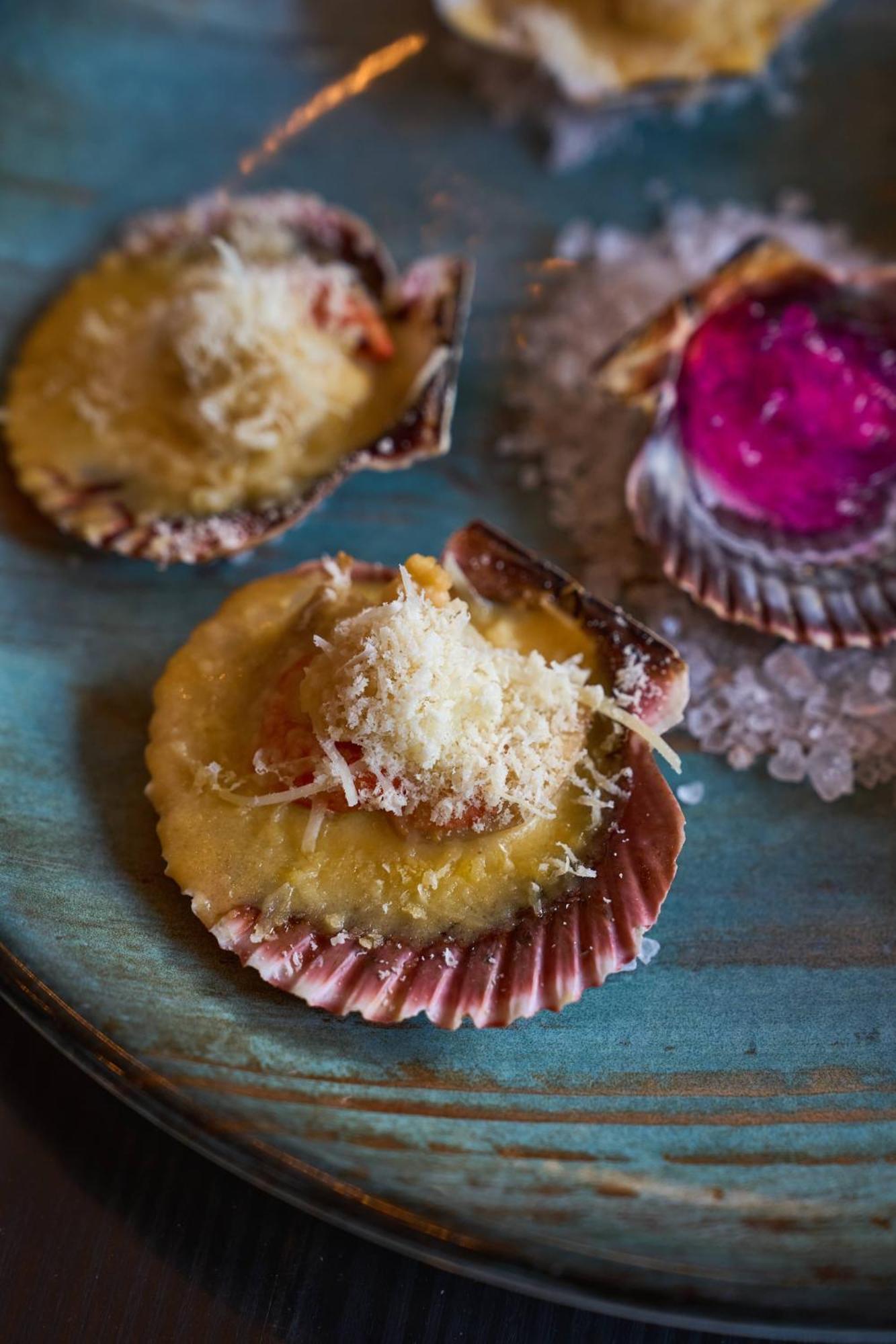 Pullman Santiago Vitacura Extérieur photo A baked scallop